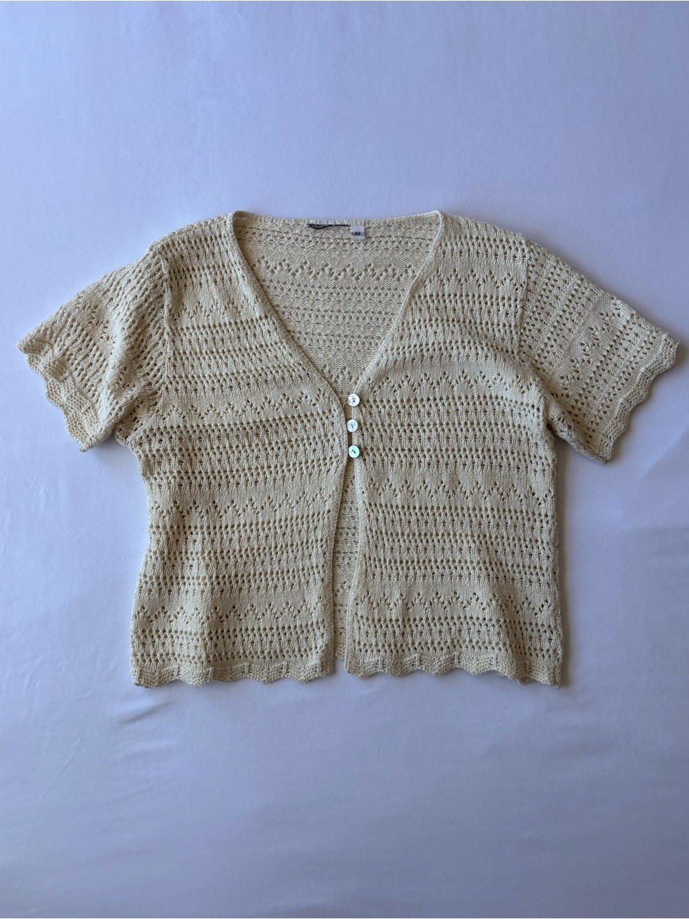 Cream crochet cardigan with cute buttons detailing